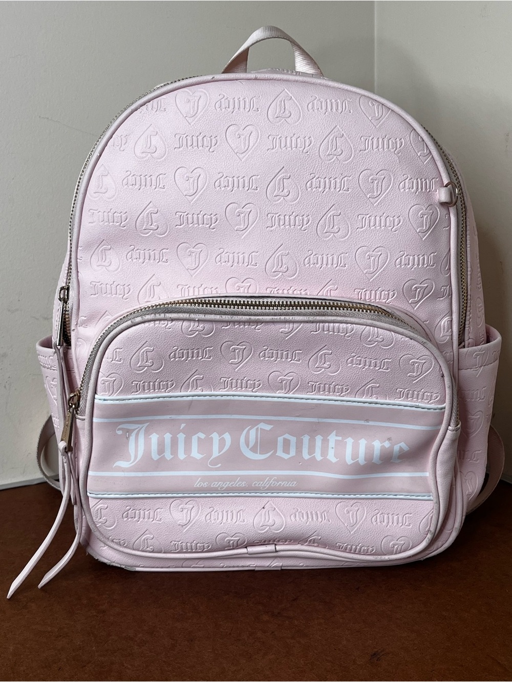 Juicy Couture Light Pink Embossed Logo Leather Backpack 14”L x 11”W x 5”D
